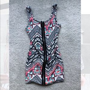 Aztec print mini dress with zipper up front.
